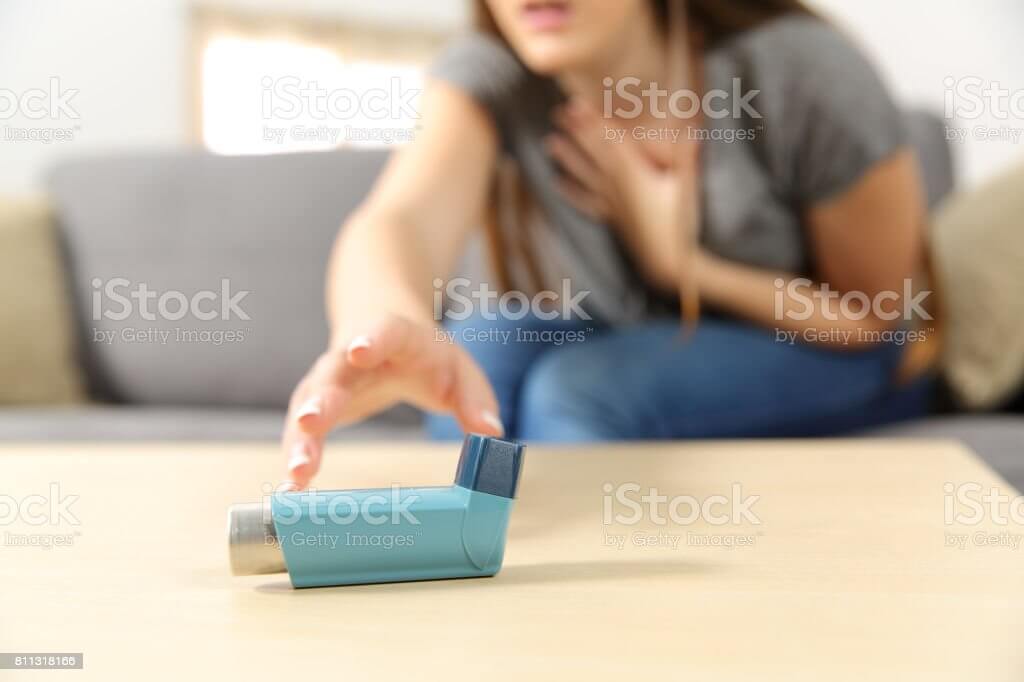 girl suffering asthma attack