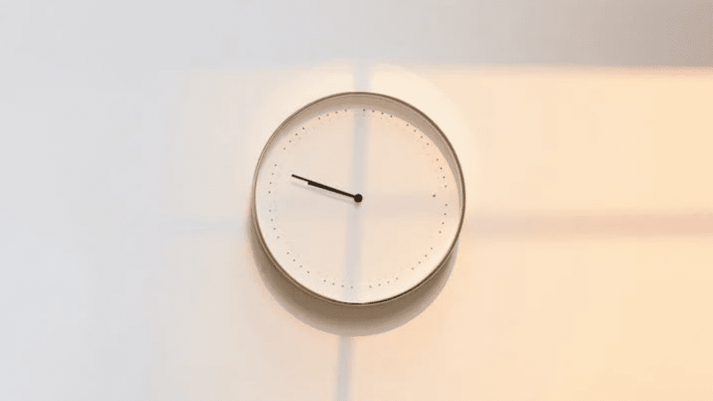 blank white clock with dot markings, white background